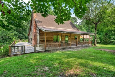 Don't miss this log cabin full of Rustic charm located in - photo 5