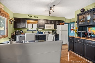 Experience lakefront perfection in this charming 3-bed, 3-bath - photo 10