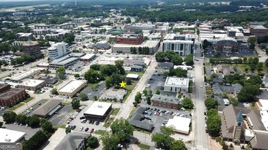 Located in the heart of Gainesville, 412 Spring Street presents - photo 3