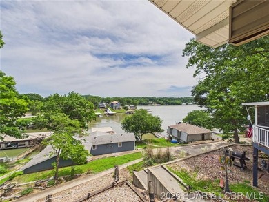 Enjoy lake living in this beautifully updated second-tier home - photo 1