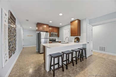 Beautifully renovated 3-bedroom, 2-bath lakefront condo at the - photo 6