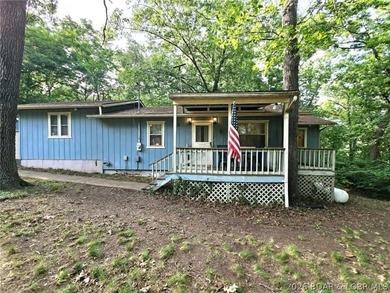 This 2-bedroom, 2-bath home offers lake access and is situated - photo 4