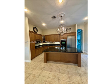 HERON BAY!!! Charming 4-bed, 3-bath home with beautiful - photo 6