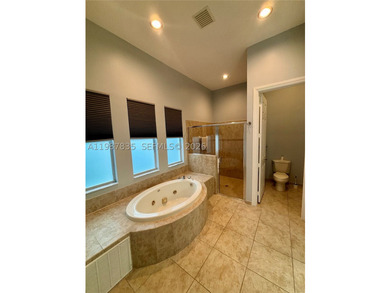 HERON BAY!!! Charming 4-bed, 3-bath home with beautiful - photo 8