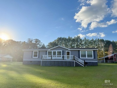 Looking for move-in ready and low maintenance? This 2023 modular