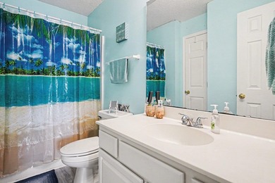 This 3-bedroom, 2-bathroom condo features a bright living room - photo 13
