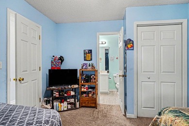 This 3-bedroom, 2-bathroom condo features a bright living room - photo 15
