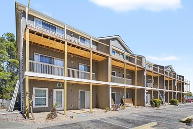 This 3-bedroom, 2-bathroom condo features a bright living room - photo 19