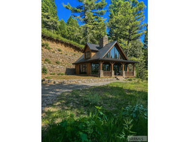 Perched high above Henry's Lake, this remarkable 13.44-acre - photo 3