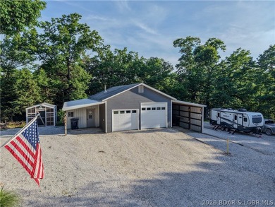New price on this Lake area retreat on 3 acres with garage/RV - photo 2
