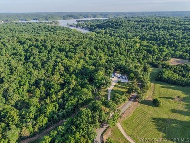 New price on this Lake area retreat on 3 acres with garage/RV - photo 4