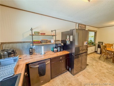 New price on this Lake area retreat on 3 acres with garage/RV - photo 10