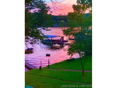 Welcome to your dream lake home, where comfort, and waterfront - photo 4