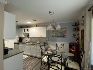 Beautifully Updated Greenbriar Model features 2 Bedrooms, 1 Full - photo 16