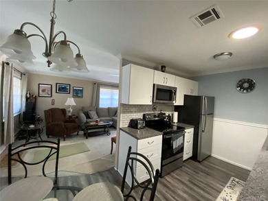 Beautifully Updated Greenbriar Model features 2 Bedrooms, 1 Full - photo 17