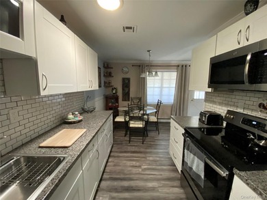 Beautifully Updated Greenbriar Model features 2 Bedrooms, 1 Full - photo 19