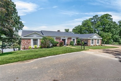 Classic brick ranch meets modern luxury in the heart of Osage - photo 5
