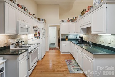 Come home to the highly sought-after gated golf course community - photo 5