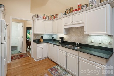Come home to the highly sought-after gated golf course community - photo 6