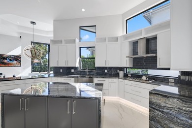 Fully renovated Mizner Country Club estate with sweeping golf - photo 12
