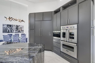 Fully renovated Mizner Country Club estate with sweeping golf - photo 14
