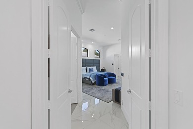 Fully renovated Mizner Country Club estate with sweeping golf - photo 19