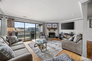 MOTIVATED SELLER! Top-floor views and lake life at its best - photo 1