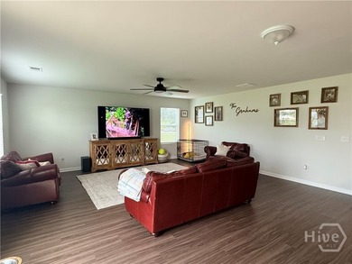 Positioned on a pond-view lot, this move-in ready 2023-built - photo 22