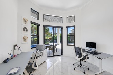 Fully renovated Mizner Country Club estate with sweeping golf - photo 22