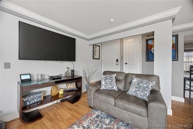 MOTIVATED SELLER! Top-floor views and lake life at its best - photo 3