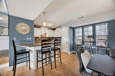 MOTIVATED SELLER! Top-floor views and lake life at its best - photo 7