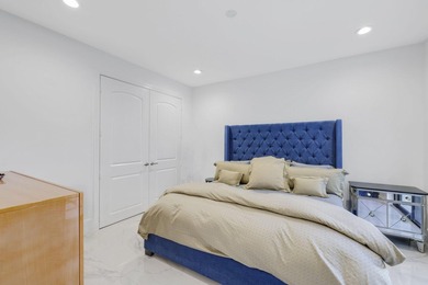 Fully renovated Mizner Country Club estate with sweeping golf - photo 27