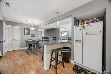 MOTIVATED SELLER! Top-floor views and lake life at its best - photo 9