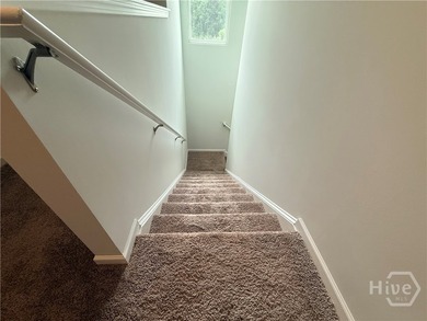Positioned on a pond-view lot, this move-in ready 2023-built - photo 29