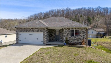 Experience lake living at its best in this beautifully updated - photo 2