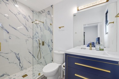 Fully renovated Mizner Country Club estate with sweeping golf - photo 34