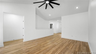 Experience lake living at its best in this beautifully updated - photo 8