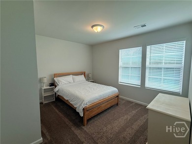 Positioned on a pond-view lot, this move-in ready 2023-built - photo 44