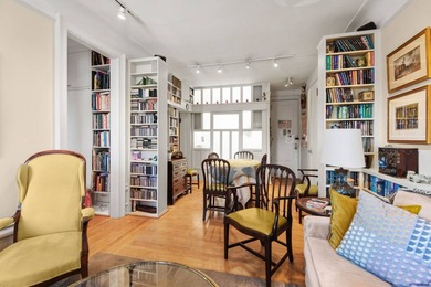 *SIGNED CONTRACT* This two-bedroom, one-bath, pre-war - photo 3