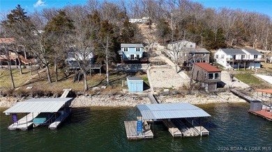 Tucked along the shoreline in year-round deep water, this - photo 6