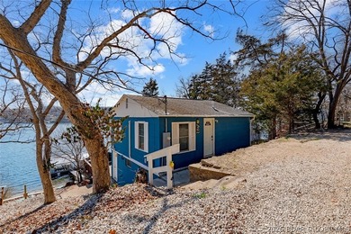 Tucked along the shoreline in year-round deep water, this - photo 8