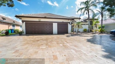 Lake Home For Sale in Coral Springs, Florida