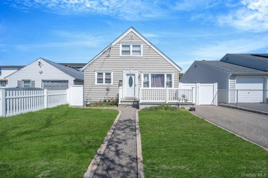 Welcome to this beautifully updated 4-bedroom, 1.5-bath Cape set - photo 1