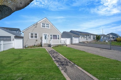 Welcome to this beautifully updated 4-bedroom, 1.5-bath Cape set - photo 2
