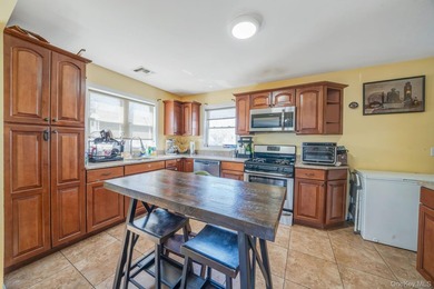 Welcome to this beautifully updated 4-bedroom, 1.5-bath Cape set - photo 4