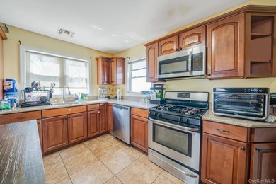 Welcome to this beautifully updated 4-bedroom, 1.5-bath Cape set - photo 6