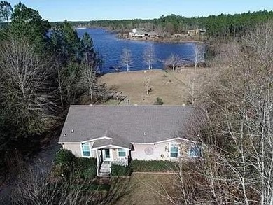 LAKEFRONT Totally Furnished BEAUTY is this 3BR.2-bath,1800 sf - photo 1