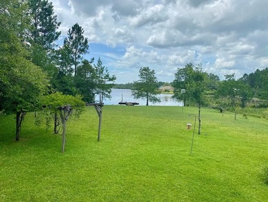 LAKEFRONT Totally Furnished BEAUTY is this 3BR.2-bath,1800 sf - photo 3