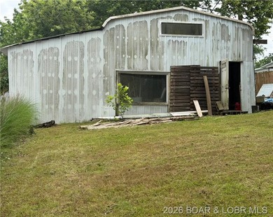 Endless Potential & Year-Round Lake Views Under $200K! On 84 - photo 2