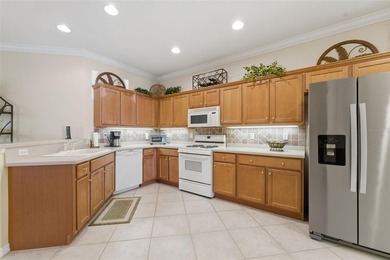Under contract-accepting backup offers. Set on a quiet lake with - photo 8